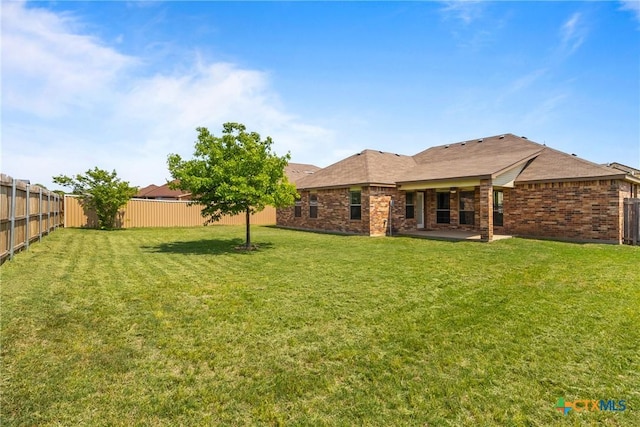 exterior space featuring a fenced backyard and a patio area