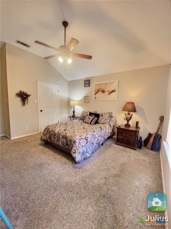 carpeted bedroom featuring lofted ceiling, visible vents, and a ceiling fan