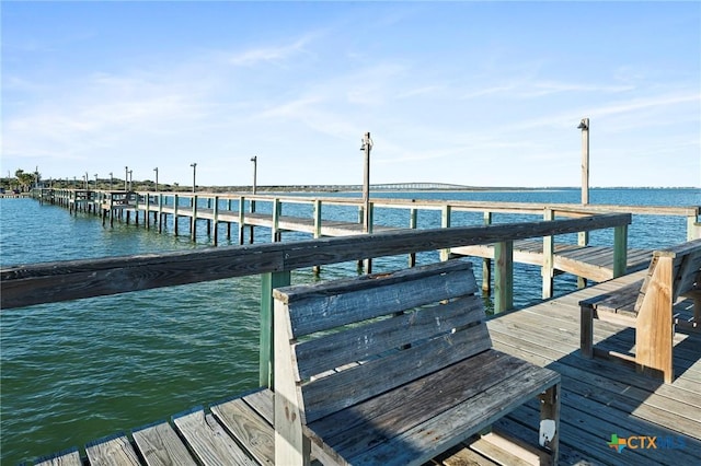 view of dock with a water view