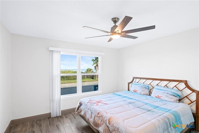 bedroom featuring wood-type flooring and ceiling fan