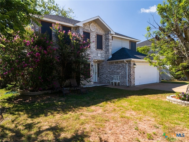 517 Margaret Lee St, Copperas Cove, TX 76522 - view of front of house with an attached garage, concrete driveway, a front lawn, and brick siding