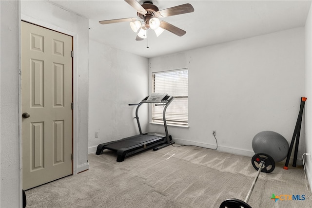 exercise area with light carpet and ceiling fan