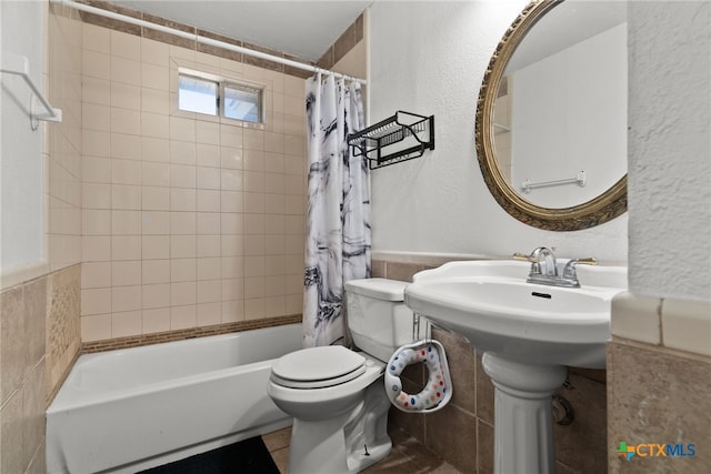 bathroom with toilet and shower / bathtub combination with curtain