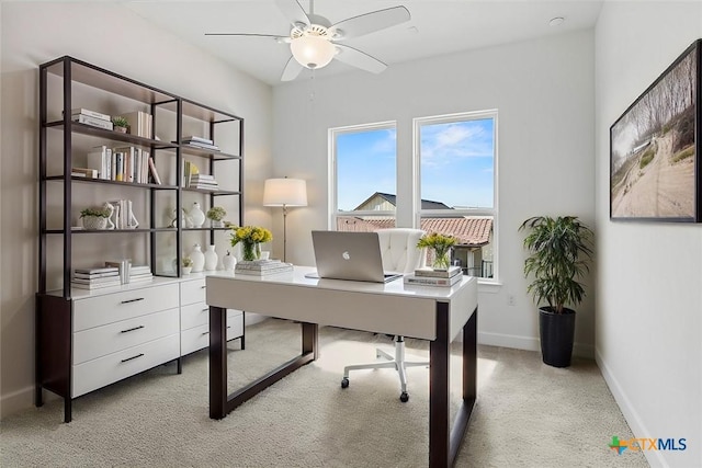 office space with ceiling fan