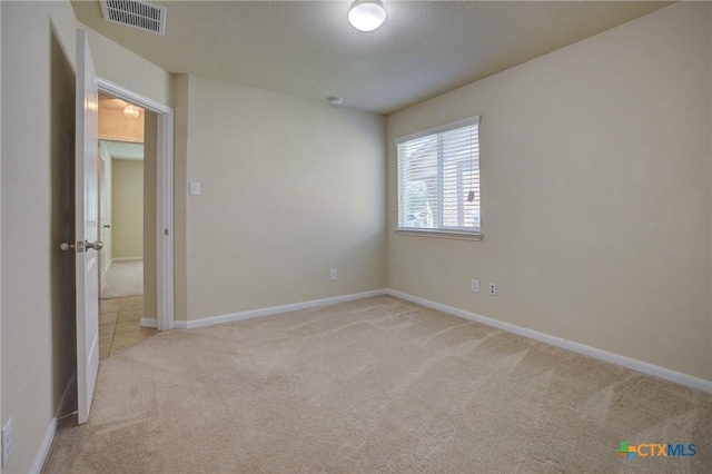 775 Spectrum Dr, New Braunfels, TX 78130 - spare room featuring light colored carpet and baseboards