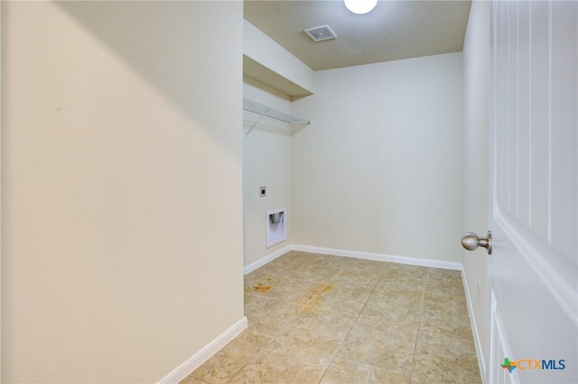 775 Spectrum Dr, New Braunfels, TX 78130 - laundry area with hookup for an electric dryer and baseboards