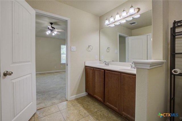 775 Spectrum Dr, New Braunfels, TX 78130 - full bathroom with tile patterned floors, double vanity, and a ceiling fan