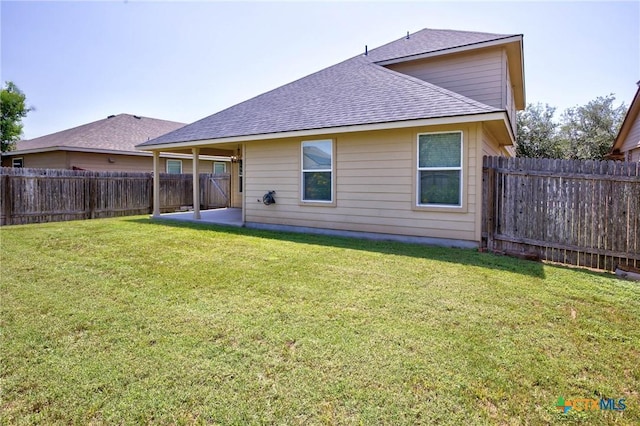 775 Spectrum Dr, New Braunfels, TX 78130 - rear view of house with roof with shingles and a fenced backyard