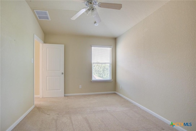 775 Spectrum Dr, New Braunfels, TX 78130 - unfurnished room with light colored carpet and ceiling fan