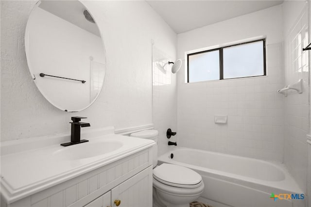 full bathroom with toilet, vanity, and washtub / shower combination