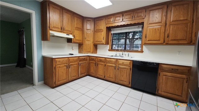 kitchen with black appliances, sink, and light tile patterned floors