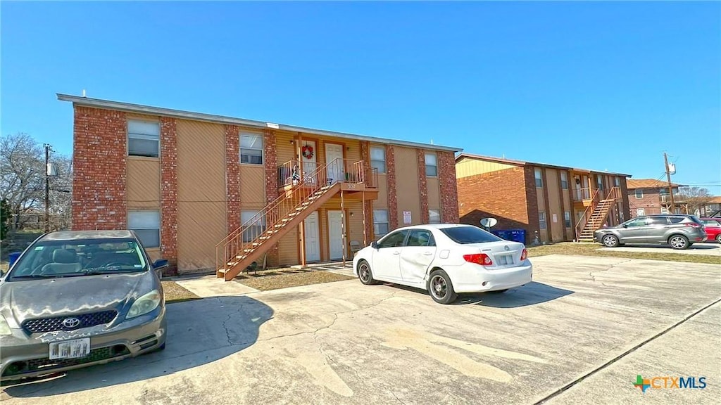 view of building exterior featuring stairs