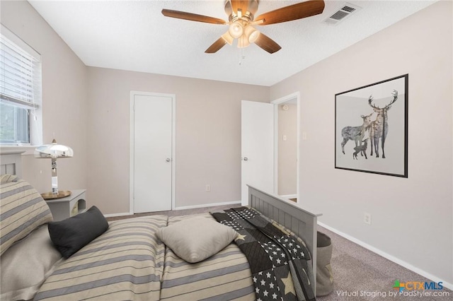 7503 Islander Dr, Austin, TX 78749 - bedroom featuring baseboards, carpet floors, and ceiling fan
