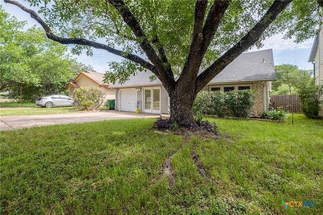 7503 Islander Dr, Austin, TX 78749 - view of front of house featuring concrete driveway and an attached garage