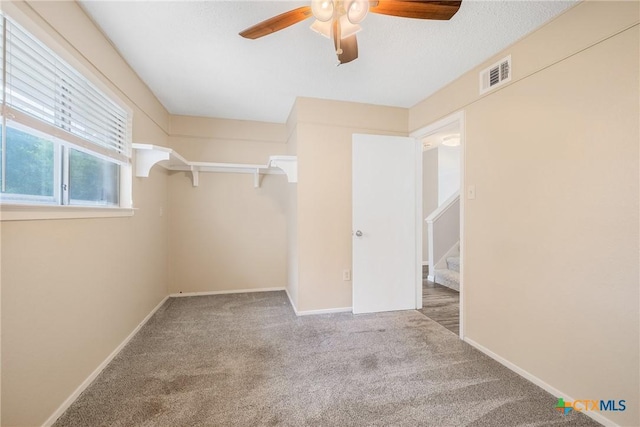 7503 Islander Dr, Austin, TX 78749 - walk in closet with a ceiling fan and carpet