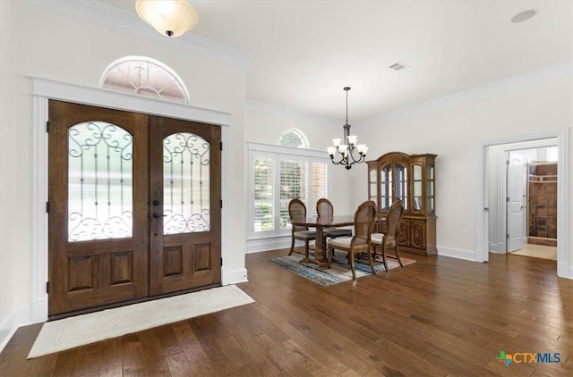 2901 Chisholm Trl, Salado, TX 76571 - foyer with a chandelier, wood-type flooring, ornamental molding, and french doors