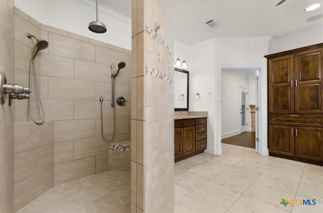 2901 Chisholm Trl, Salado, TX 76571 - bathroom featuring crown molding, vanity, walk in shower, and tile patterned floors
