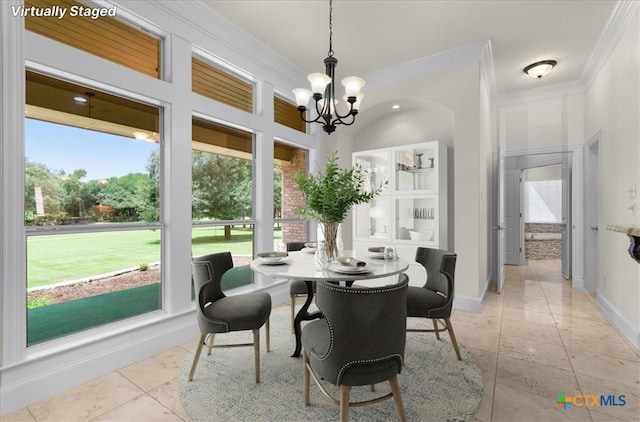 2901 Chisholm Trl, Salado, TX 76571 - dining area featuring crown molding, a chandelier, and plenty of natural light