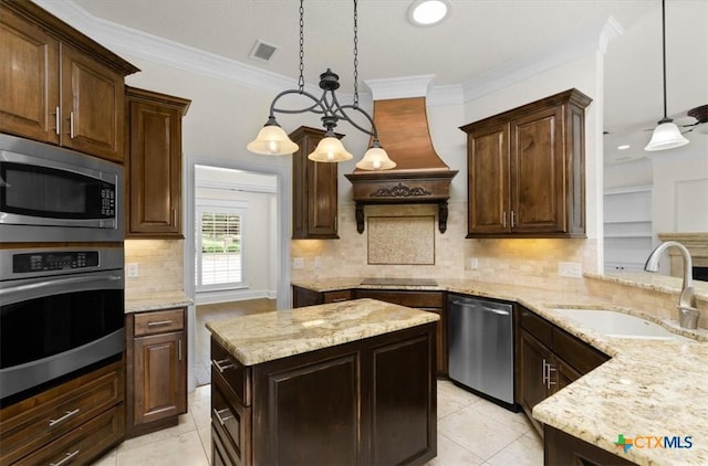 2901 Chisholm Trl, Salado, TX 76571 - kitchen with stainless steel appliances, light stone counters, light tile patterned flooring, crown molding, and recessed lighting