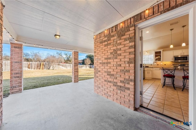 view of patio with an outdoor kitchen