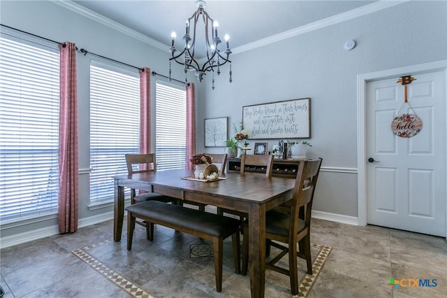 dining area featuring ornamental molding, a chandelier, and tile patterned flooring