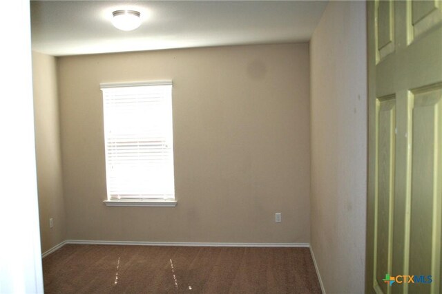 308 E Vega Ln, Killeen, TX 76542 - carpeted empty room with baseboards
