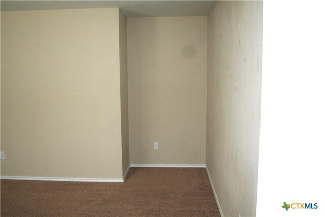 308 E Vega Ln, Killeen, TX 76542 - carpeted empty room featuring baseboards