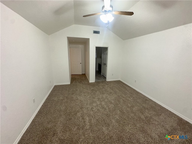 unfurnished bedroom with carpet floors, lofted ceiling, baseboards, and a ceiling fan