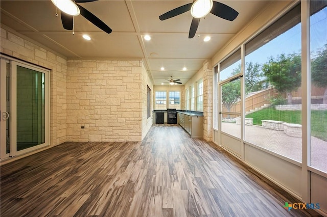 1127 Redleaf Dr, Nolanville, TX 76559 - unfurnished sunroom featuring ceiling fan, wood finished floors, and recessed lighting