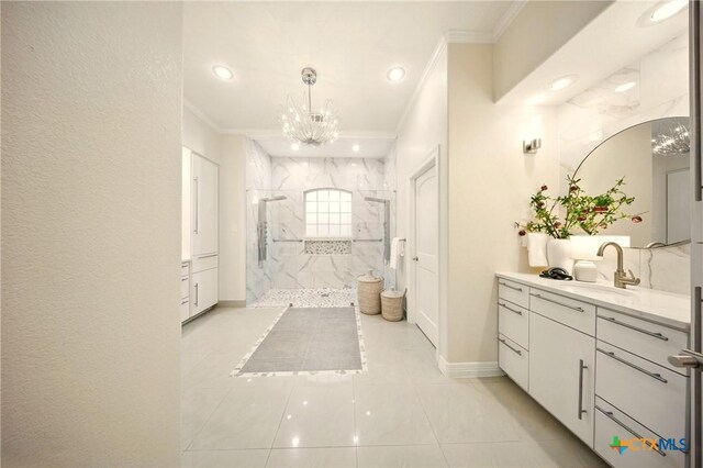 1127 Redleaf Dr, Nolanville, TX 76559 - full bath with a chandelier, a marble finish shower, ornamental molding, vanity, and baseboards