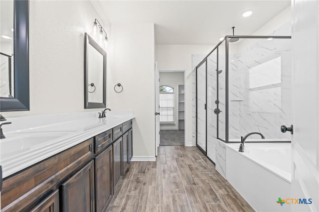 bathroom with vanity and plus walk in shower