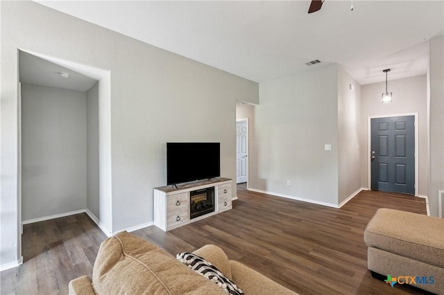 2617 Turning Creek St, Temple, TX 76504 - living room with wood finished floors, ceiling fan, and a fireplace