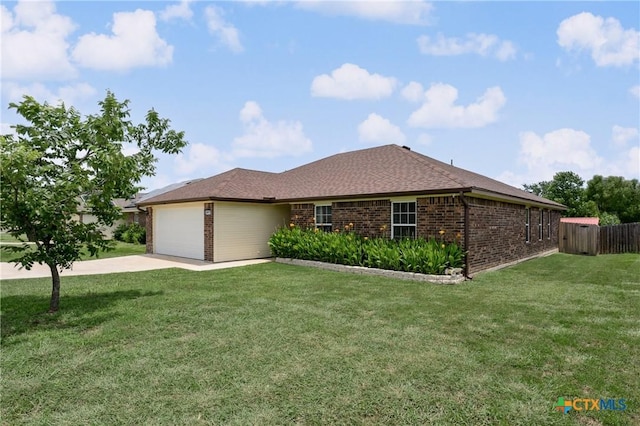2617 Turning Creek St, Temple, TX 76504 - view of front facade with brick siding, a garage, driveway, and roof with shingles