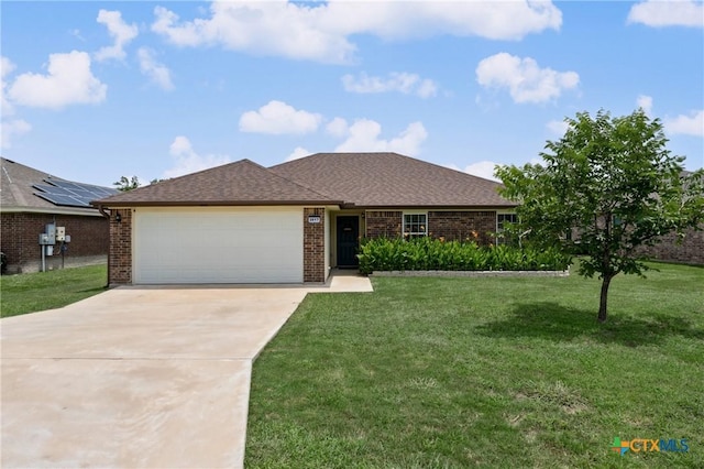 2617 Turning Creek St, Temple, TX 76504 - ranch-style house with concrete driveway, brick siding, an attached garage, a front yard, and roof with shingles
