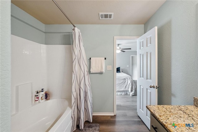 2617 Turning Creek St, Temple, TX 76504 - full bathroom with wood finished floors, shower / tub combo with curtain, ensuite bath, vanity, and ceiling fan