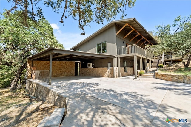 front facade featuring a carport