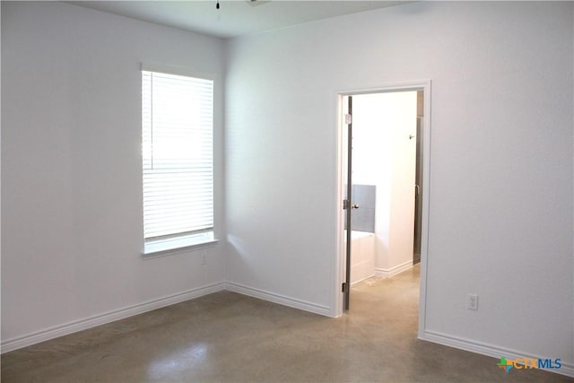 empty room featuring a wealth of natural light