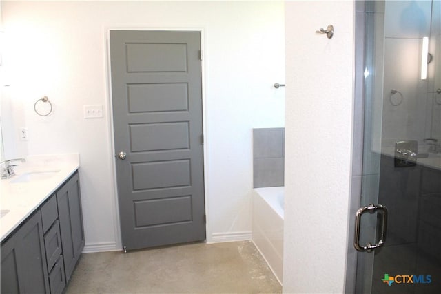 bathroom with vanity and plus walk in shower