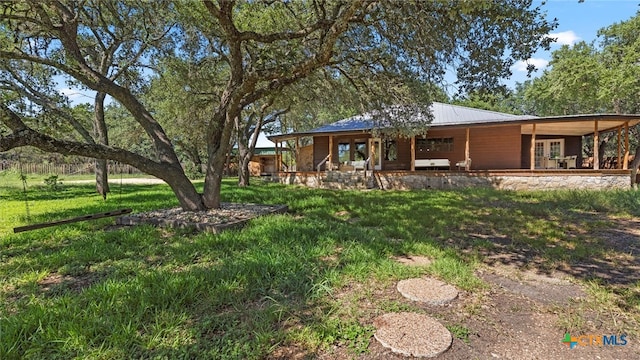 exterior space featuring covered porch