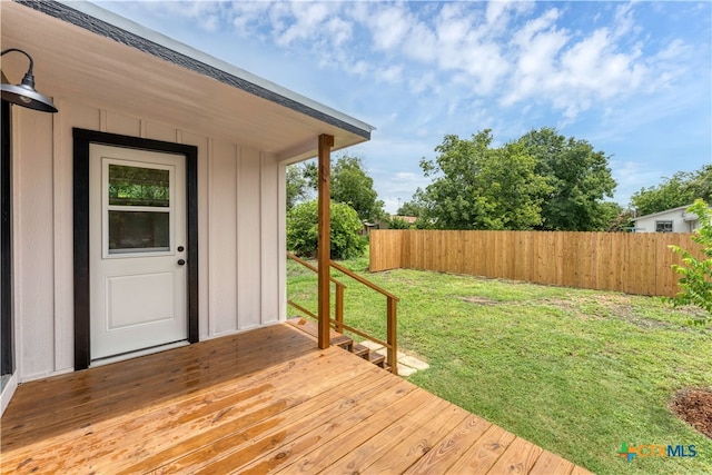 deck featuring a yard