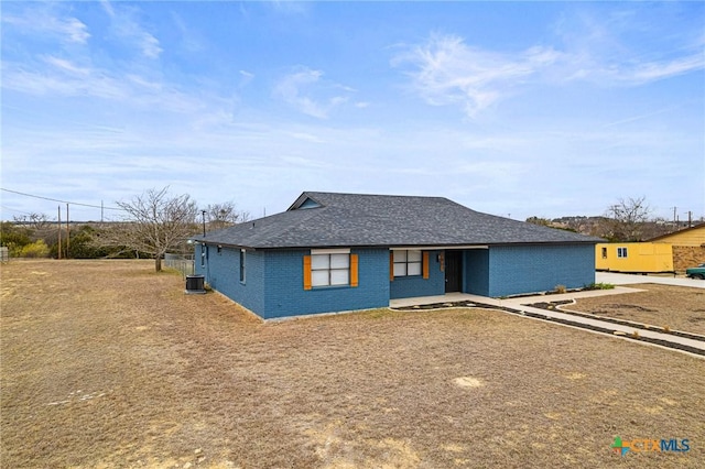 view of front of home featuring cooling unit