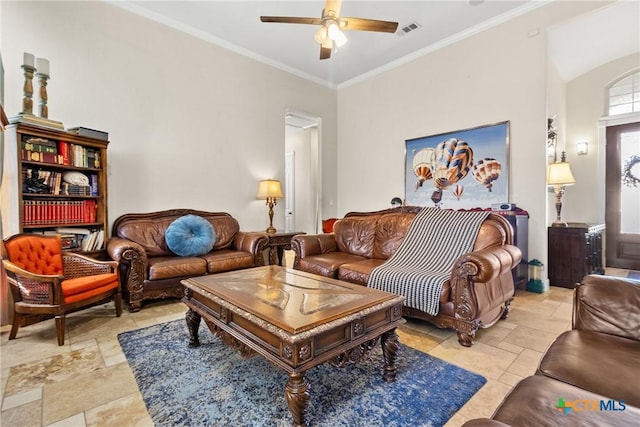 living room featuring crown molding and ceiling fan