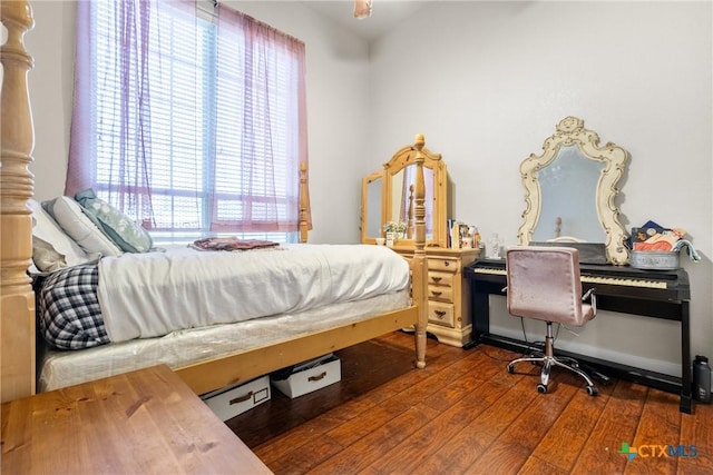 bedroom featuring hardwood / wood-style floors