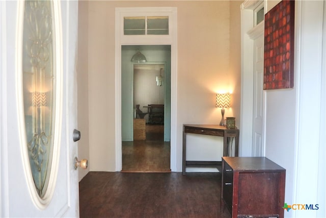 hall featuring dark wood-type flooring