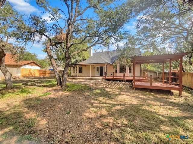 view of yard with a deck