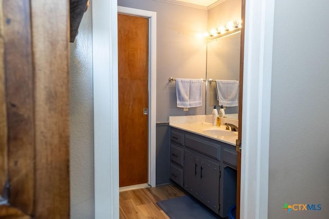 3309 Cottonwood Ln, Temple, TX 76502 - bathroom with wood finished floors and vanity