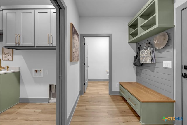 438 Cedar Mountain Dr, Marble Falls, TX 78654 - mudroom featuring light wood-style flooring and baseboards