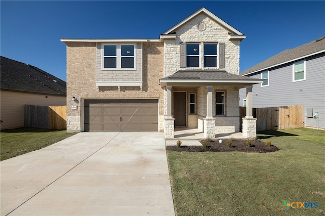 view of front facade with a front lawn, a porch, and a garage