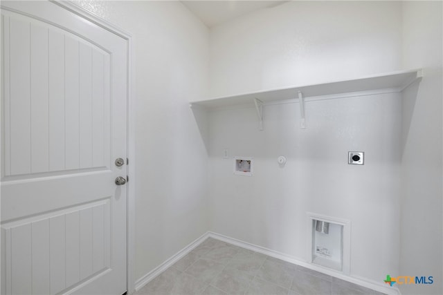 laundry room featuring electric dryer hookup, gas dryer hookup, hookup for a washing machine, and light tile patterned floors