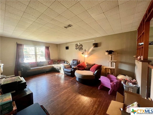 living room featuring dark hardwood / wood-style flooring